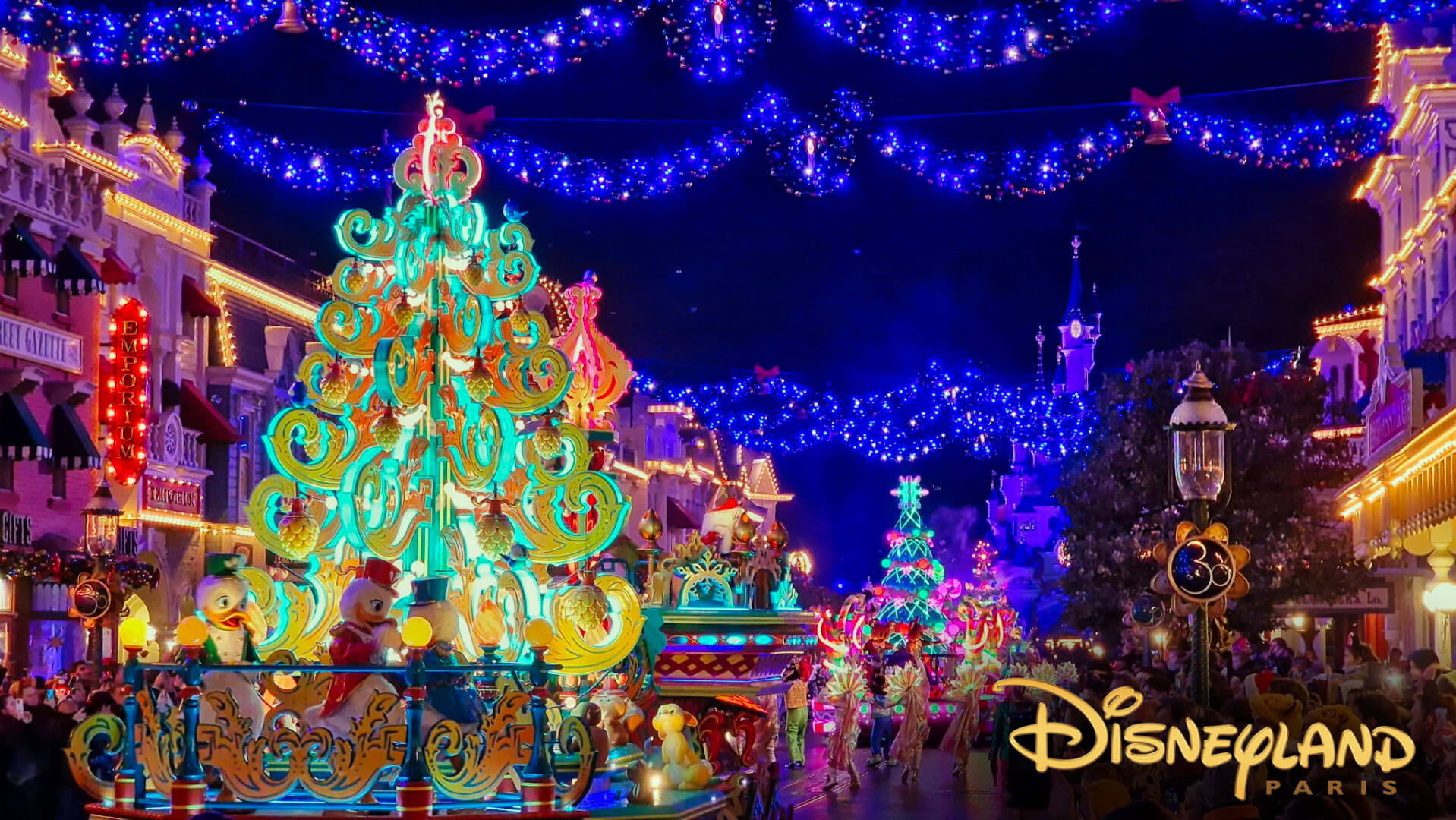 Sleeping beauty Castle at night with Christmas lights, Disneyland Park, Disneyland  Paris